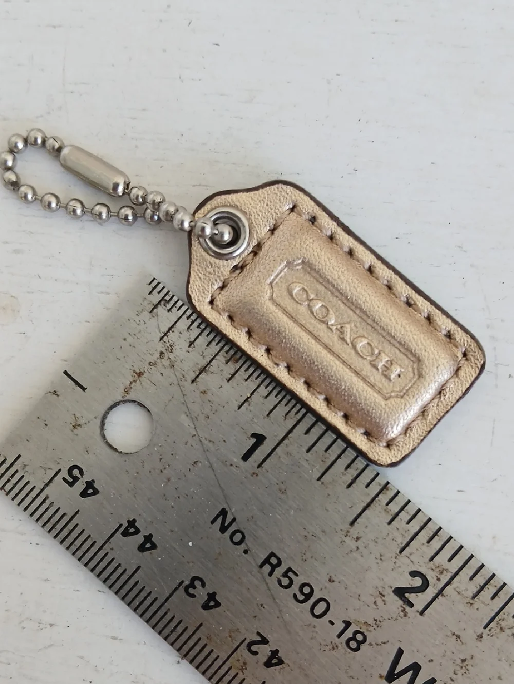 COACH Hang Tag Gold